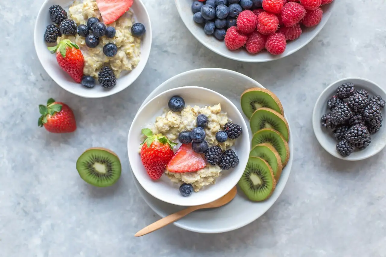 Buy Billionaire Brain Wave: bright breakfast table with oats and fresh berries